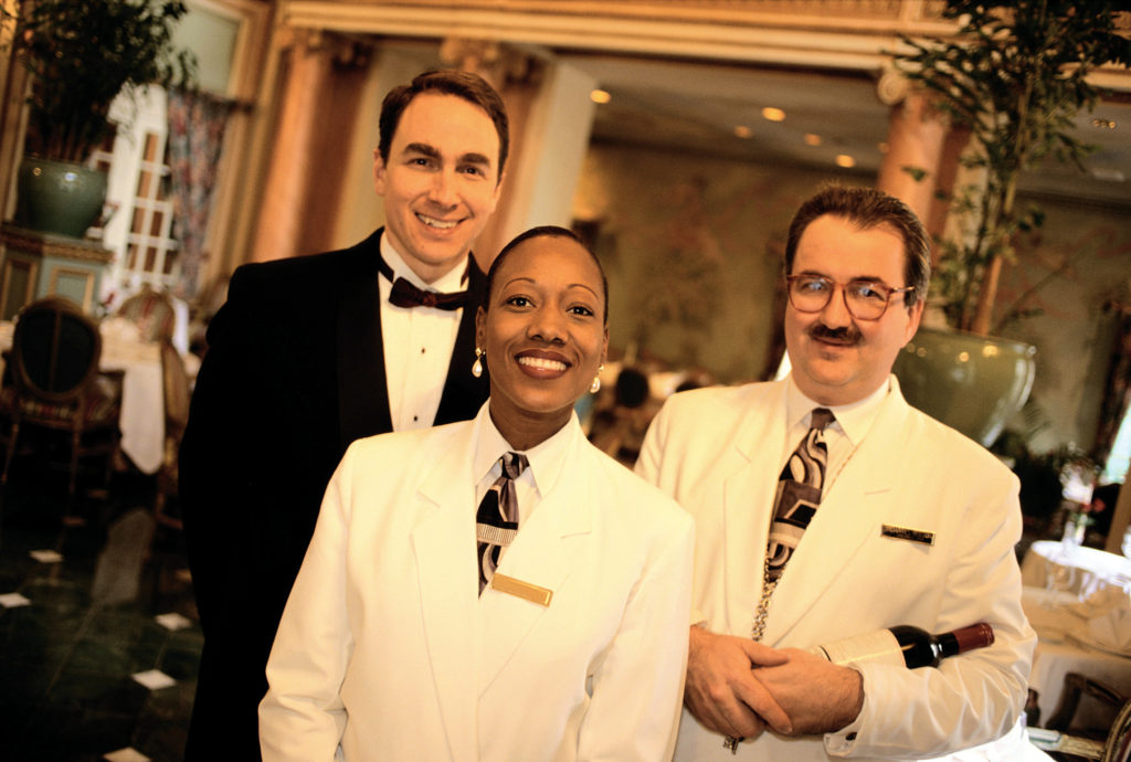 hotel staff posing and smiling